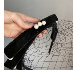 Bow rim headband pearl beads and veil.